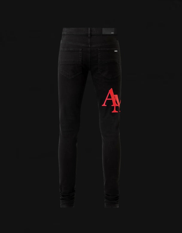 Amiri Staggered Logo Skinny Jeans